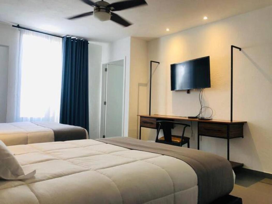 Aparthotel Urban Gran Plaza à Zapopan Extérieur photo