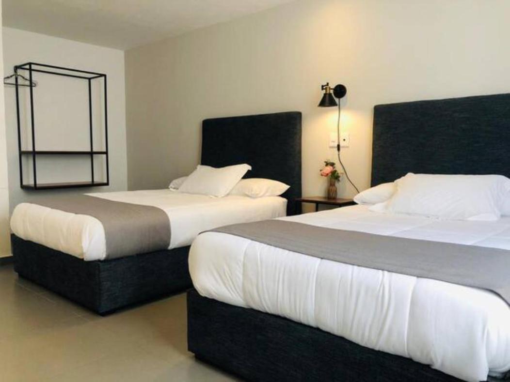 Aparthotel Urban Gran Plaza à Zapopan Extérieur photo