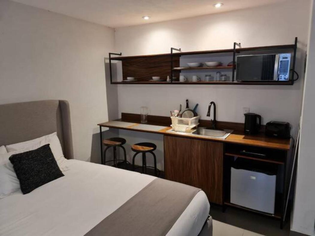 Aparthotel Urban Gran Plaza à Zapopan Extérieur photo