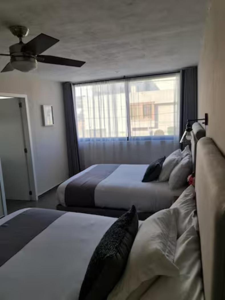 Aparthotel Urban Gran Plaza à Zapopan Extérieur photo